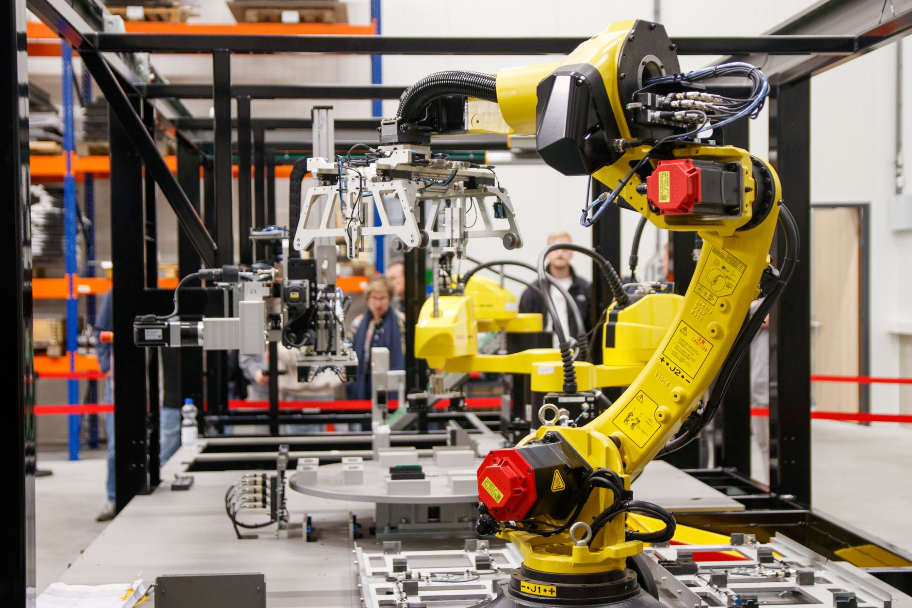 Industrial cybersecurity incident response team coordinating smart factory breach containment