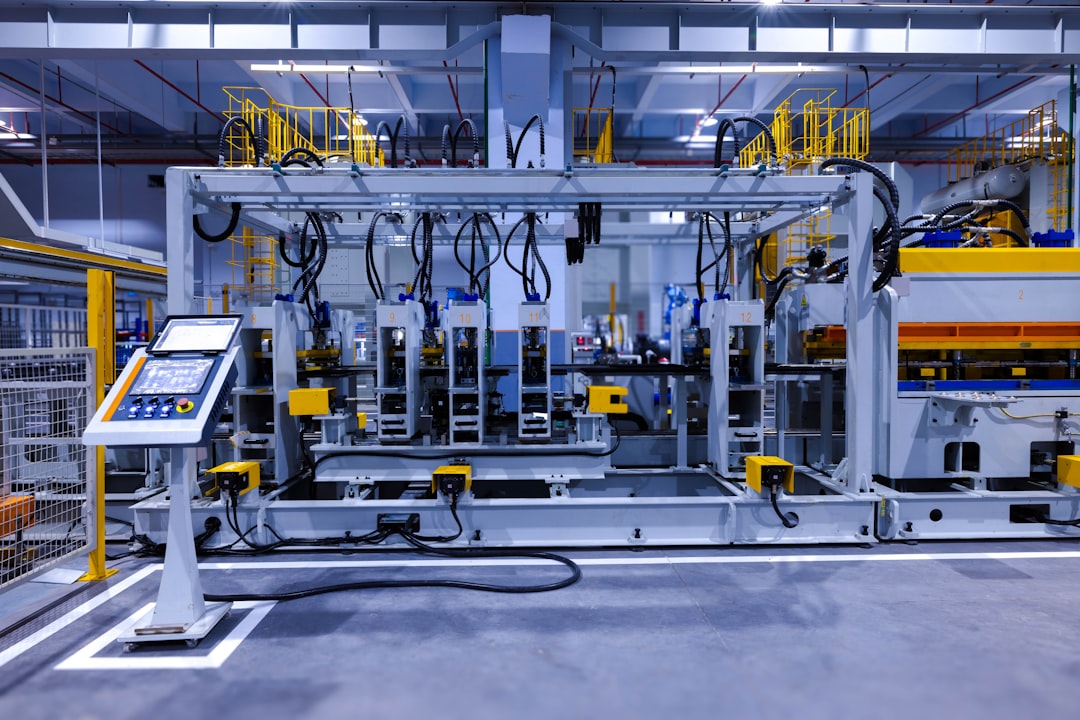 Human worker and cobot collaborating on assembly line in Industry 5.0 factory 2026