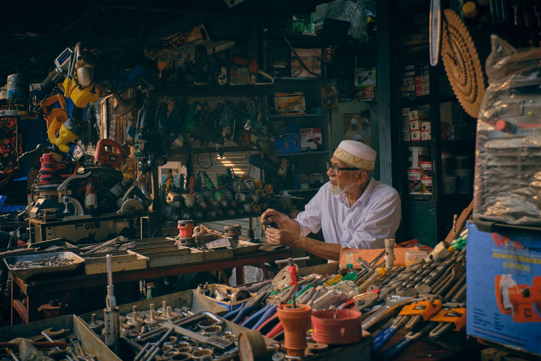 Small business owner overwhelmed by multiple software subscriptions and tool sprawl costs