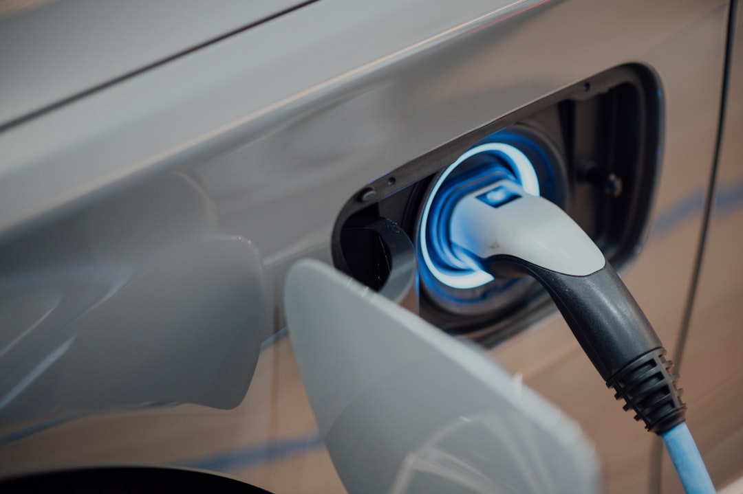 Electric vehicle market data dashboard showing sales growth and regional distribution