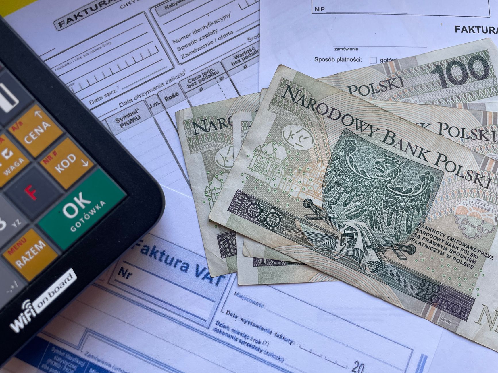 Freelancer preparing and sending a professional invoice via laptop