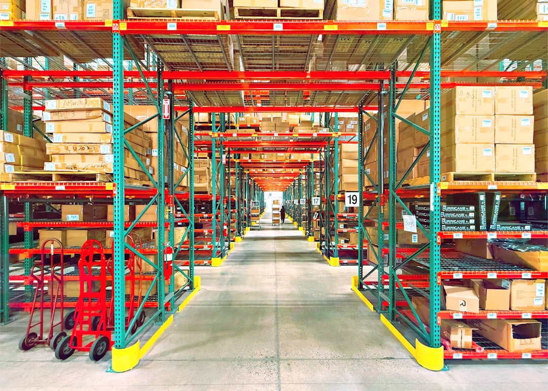 Warehouse automation with robots and IoT sensors tracking inventory in 2026